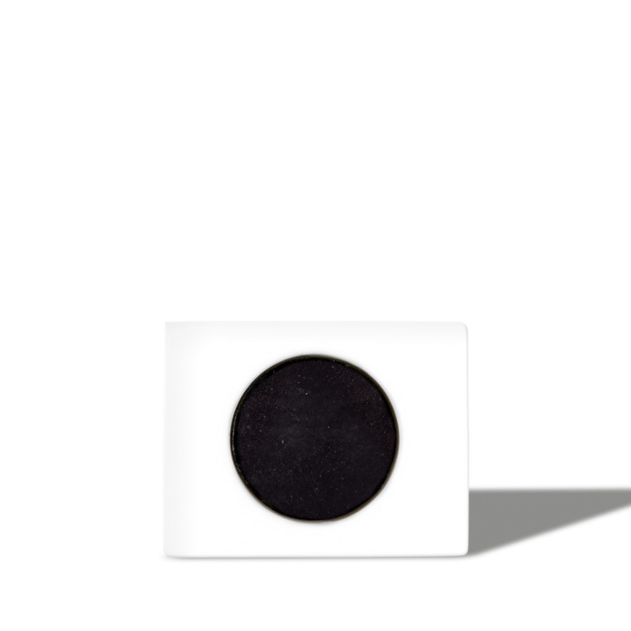 Square white ceramic charcoal air purifier with round black activated charcoal filter, modern eco-friendly odor absorber.