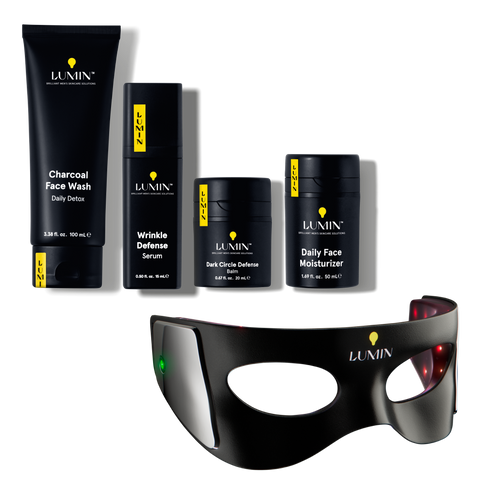 Lumin men's skincare products set including Charcoal Face Wash, Wrinkle Defense Serum, Dark Circle Defense Balm, Daily Face Moisturizer, and a black LED therapy mask.