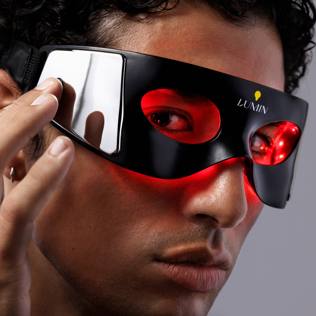 Man with led eye mask on