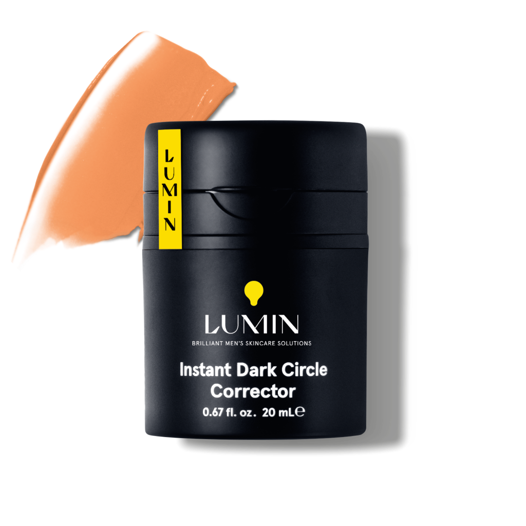 Lumin Instant Dark Circle Corrector men's skincare cream in black container with beige color swatch for under-eye brightening.