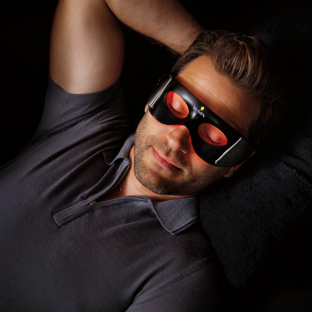 Man with LED eye mask