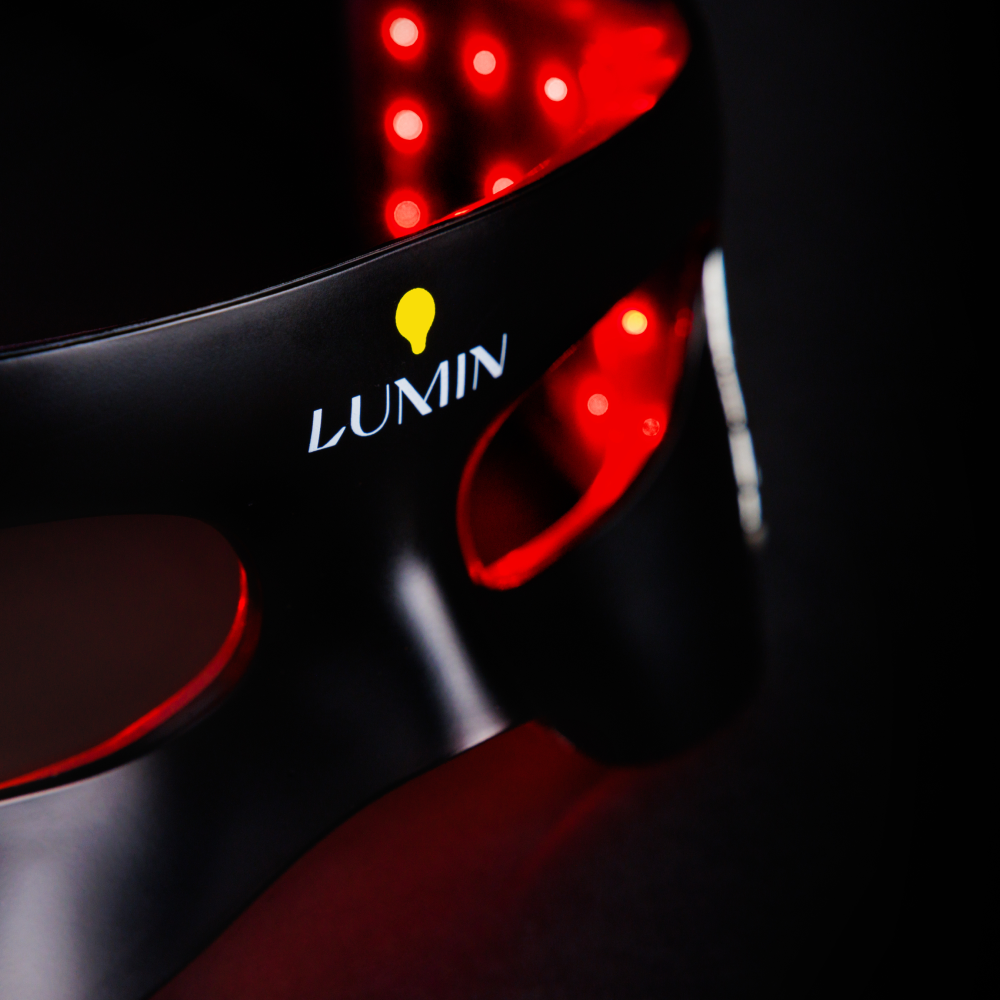 Lumin LED light therapy face mask with red infrared lights for skincare and anti-aging treatments.