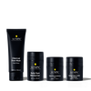 Lumin men's skincare set including charcoal face wash, daily face moisturizer, dark circle defense balm, and instant dark circle corrector.