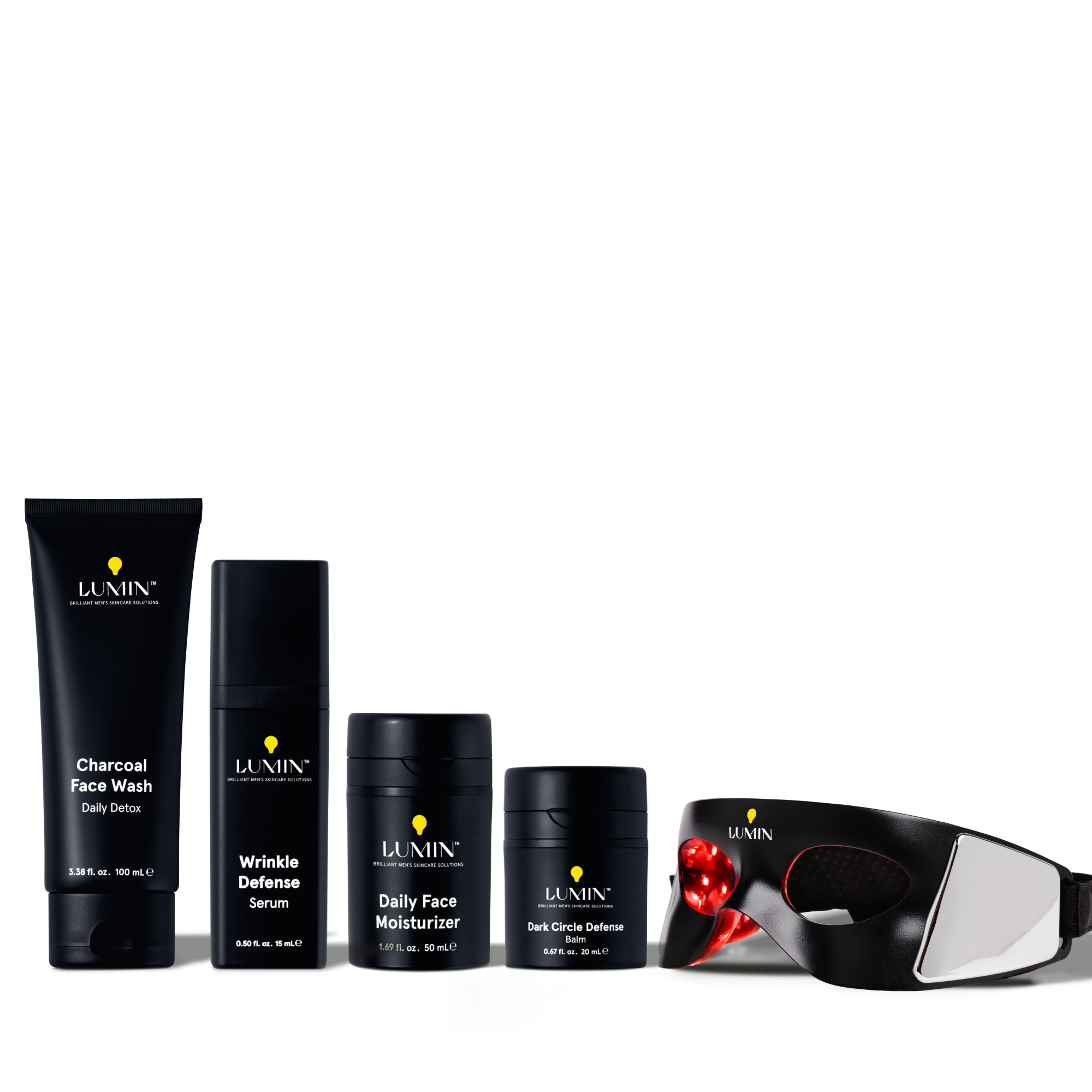 Lumin men's skincare set with charcoal face wash, wrinkle defense serum, daily moisturizer, dark circle balm, and LED eye mask.