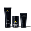 Lumin men's skincare set with Charcoal Face Wash, Extra Strength Moisturizer, and Charcoal Scrub for detox and hydration.