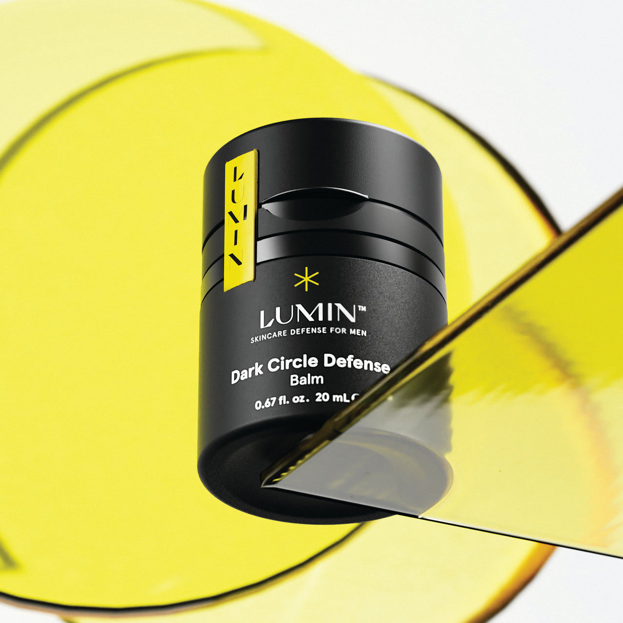 lumin pdp dark circle defense balm on table